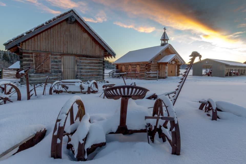 Photo of heritage farm implements with snow